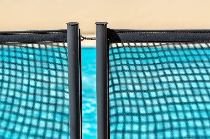 Removable Mesh Fence by Poolside